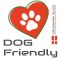 Ein hundefreundliches Logo mit einem Herzen und den Worten „Hundefreundlich“.